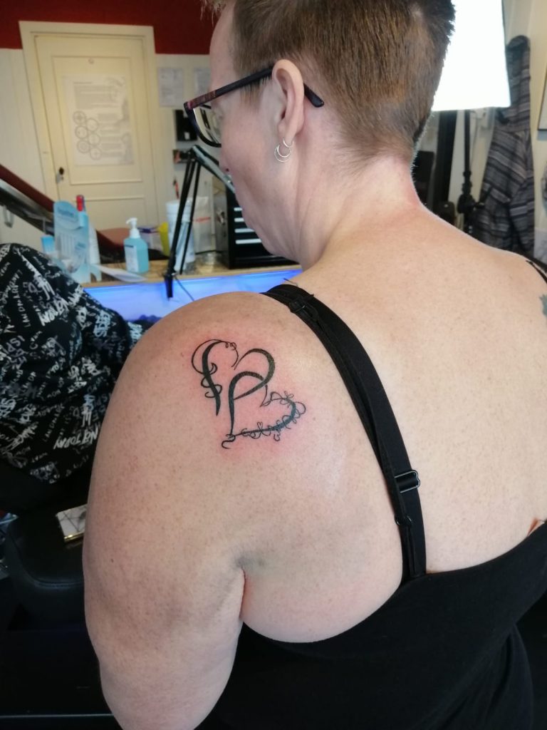 two hearts tattoo