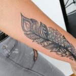 cover up feather tattoo